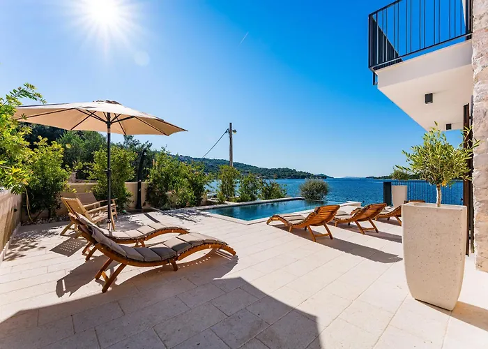 Вилла Seafront Draga With Heated Infinity Pool *